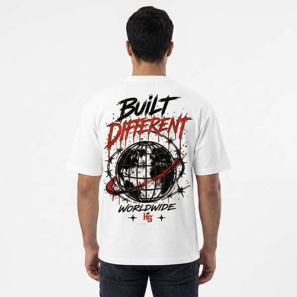 Back of the white boxy oversized T-shirt with a Built Different globe graphic in black and red.