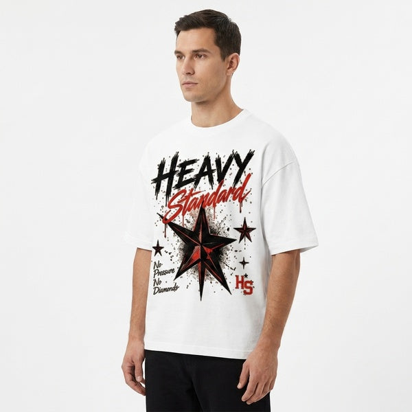 White boxy oversized T-shirt with dropped shoulders and a Heavy Standard star graphic, three-quarter front view.