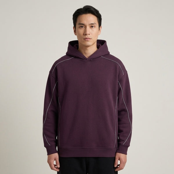 Purple oversized piping fleece hoodie, model in a straight front view.