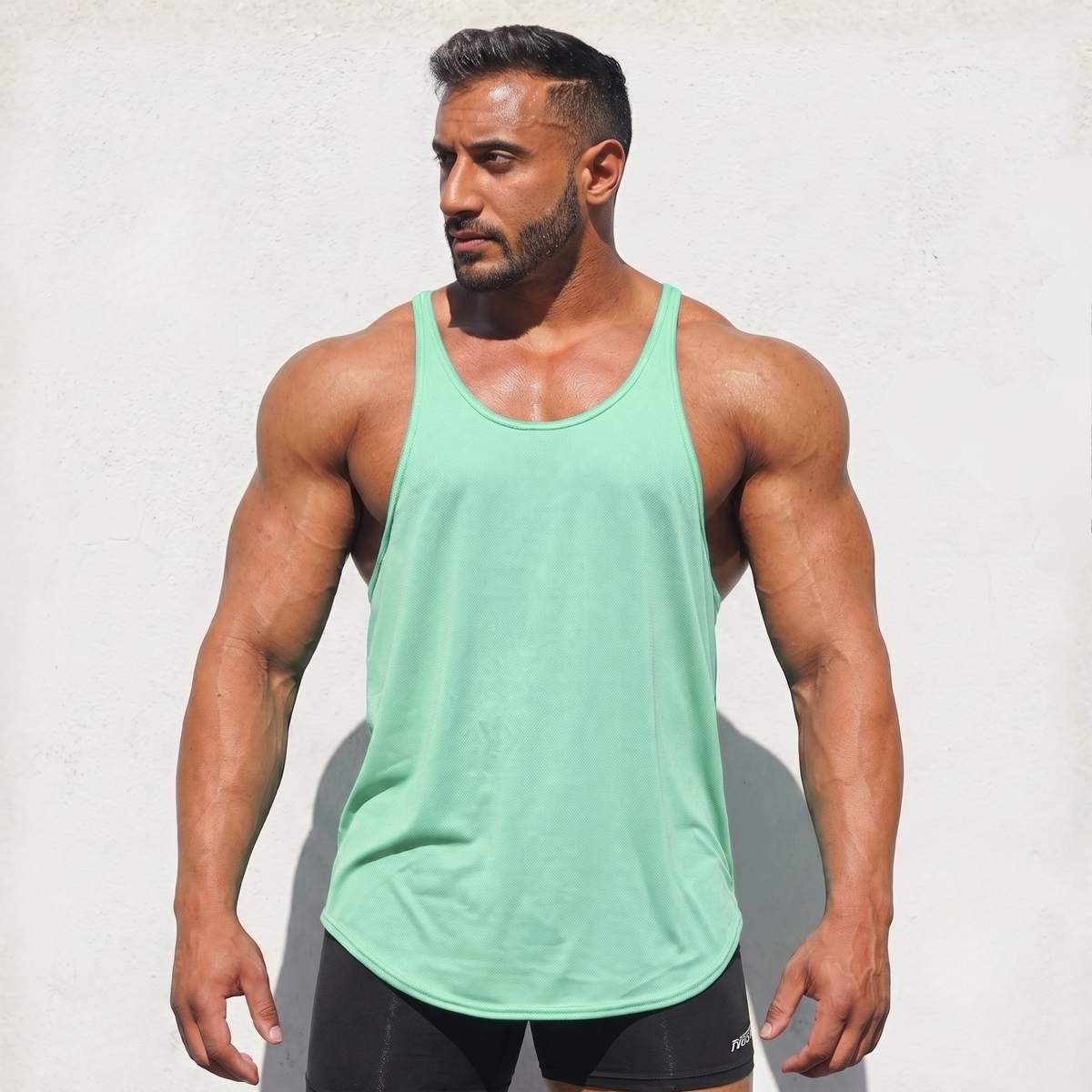 Mint Stringer Tank Top, model in a front view.