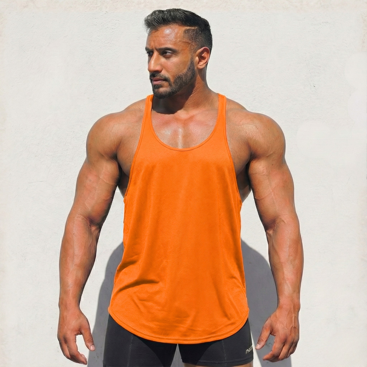 Orange Stringer Tank Top, model in a front view.