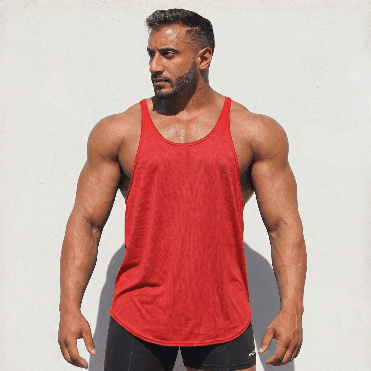 Red Stringer Tank Top, model in a front view.